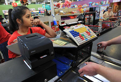 HHP Student buying groceries for the week using the $25 gift card - Photo by Mayra Beltran, Houston Chronicle