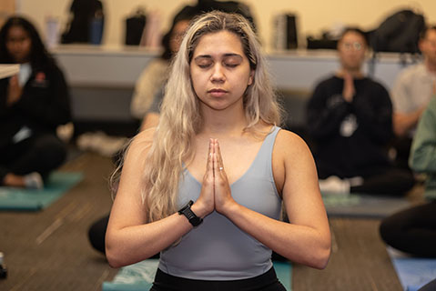 Photo of student participating in yoga