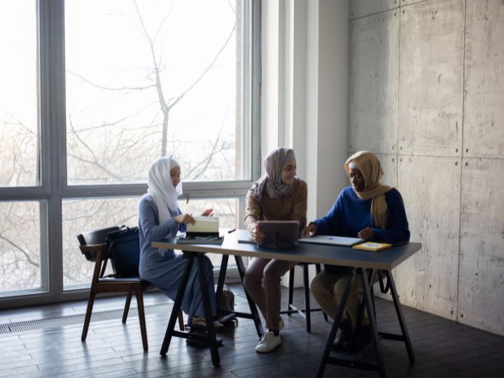 3 women studying