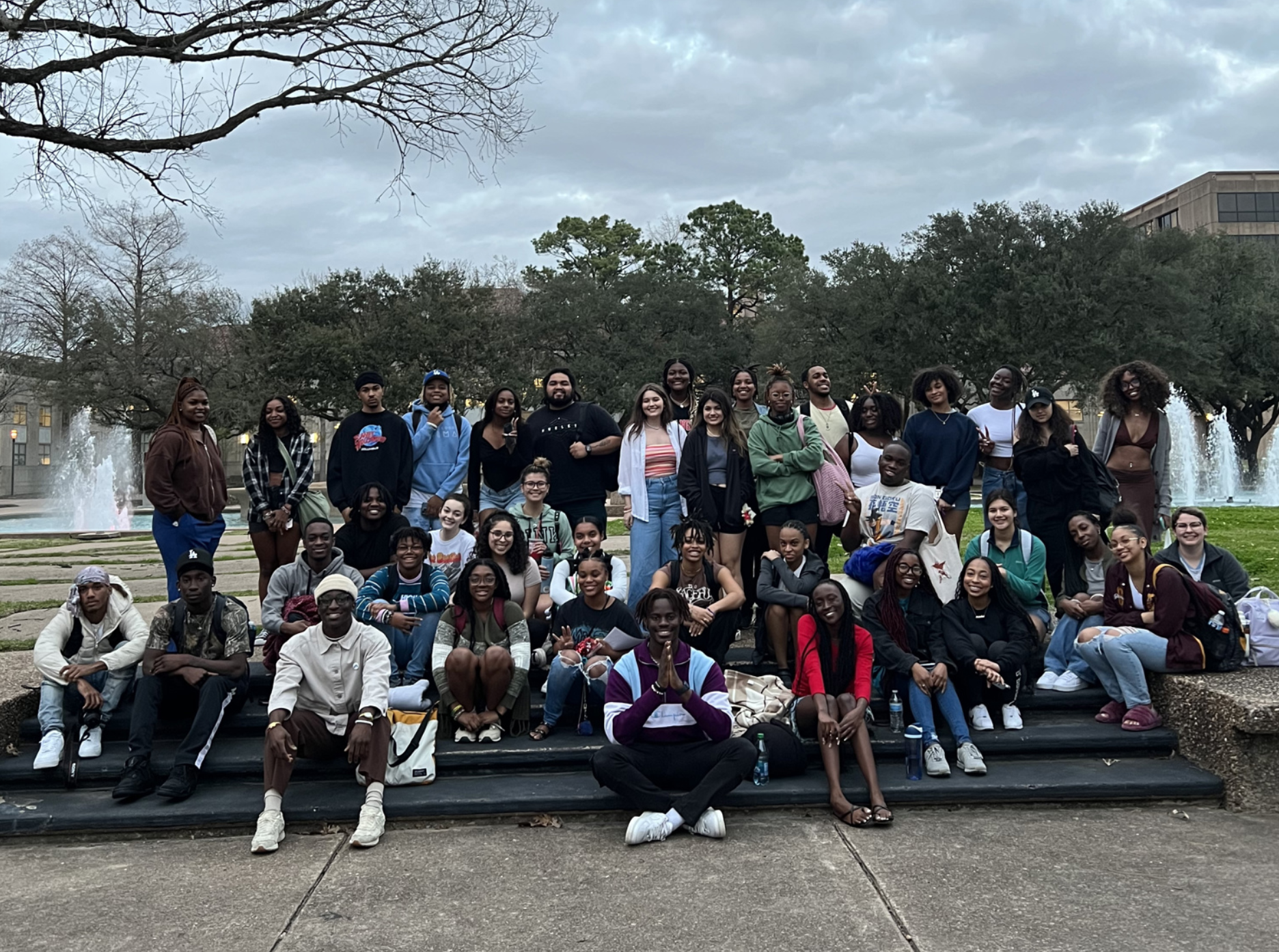 Large Group of students who practice meditation at UH Cullen Fountains.
