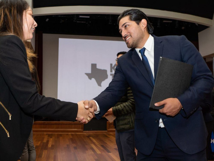 career fair attendee greeting recruiter