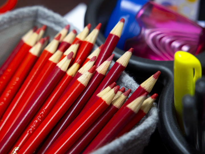 Red pencils in a container
