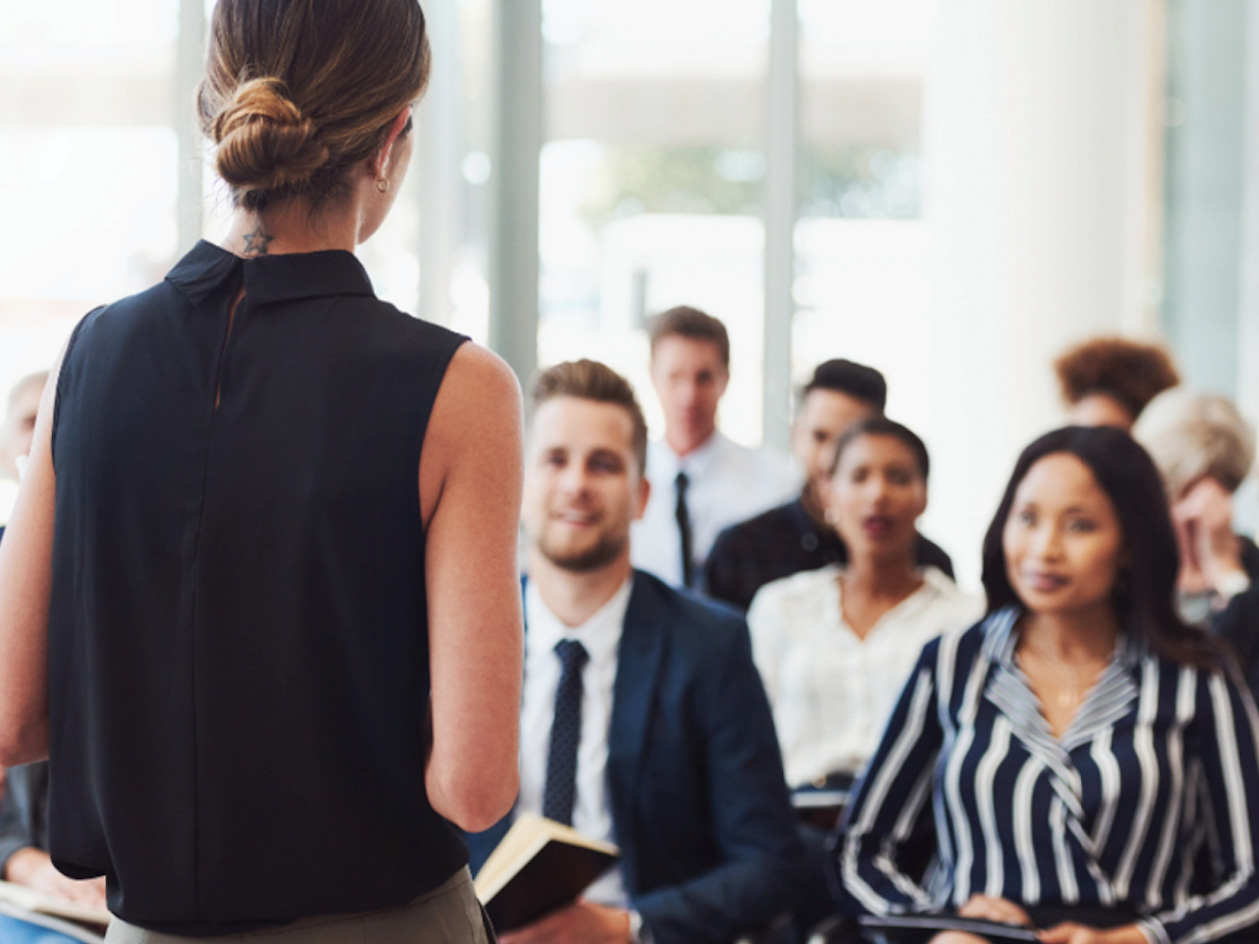 People listen to a professional speaker