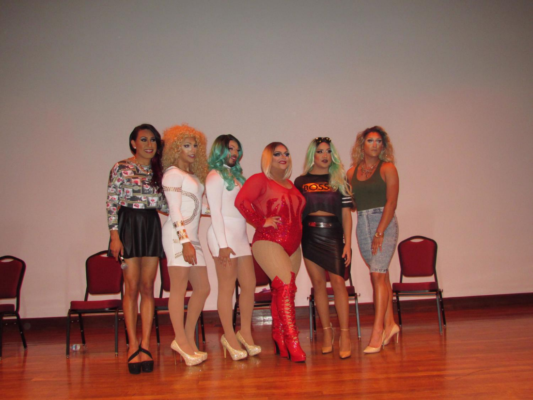 Drag queens posing for a picture