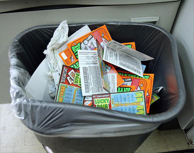 Trashcan fill with lottery tickets 
