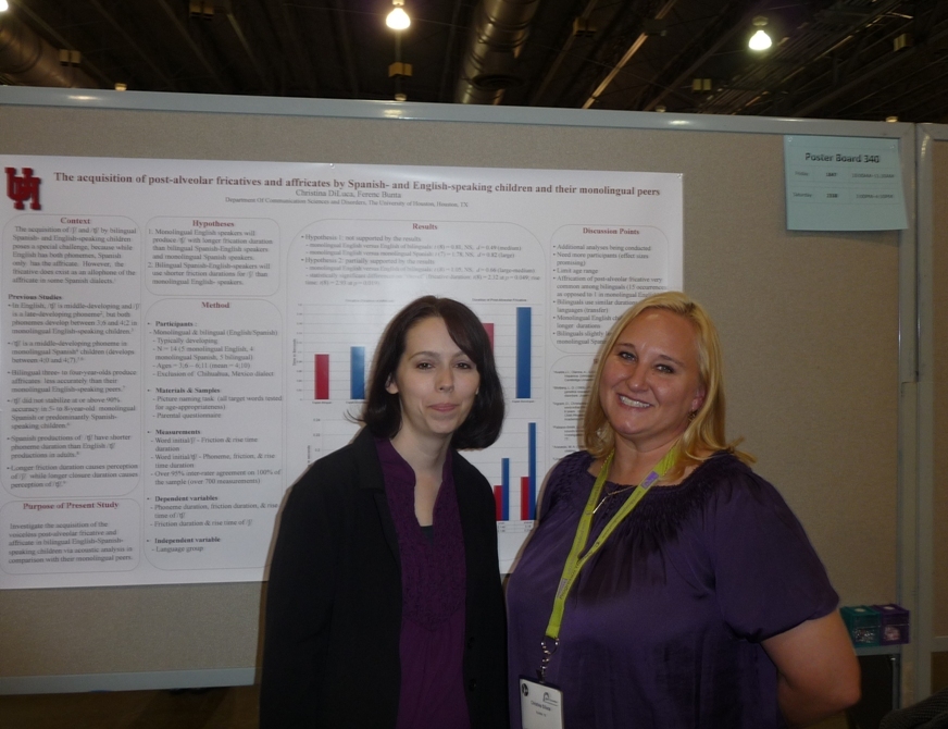 Graduate students, Michelle Norton and Christina DiLuca at Ms. DiLuca's poster