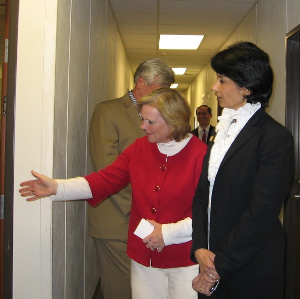 Dr. Dunkelberger conducts a tour of the ComD Department to President Khator