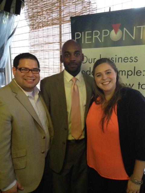 (from left) Pierpont Account Supervisor, grad alum, and current adjunct professor David Gonzales with current grad student Darius Davis, and Daffodil Reumund of Pierpont Comm. — at Cook & Collins.