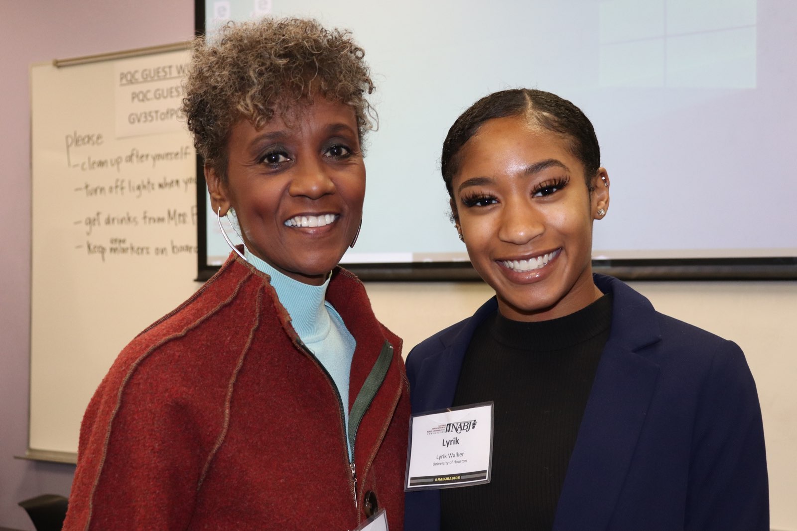 Picture of Lyrik Walker with a speaker at the NABJ bootcamp conference.