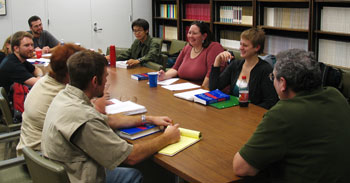 Graduate students meet with faculty