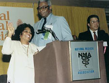 Photo of Dr. Irby Jones being sworn ins as first female president of the NMA.