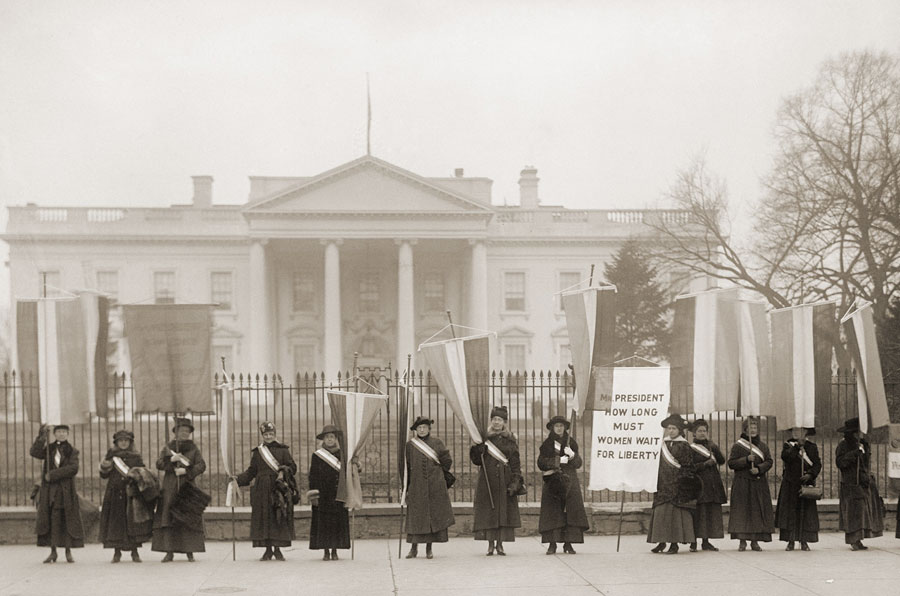 National Women’s Party demonstration in front of the White House in 1918. The banner protests Wilson’s failure to support women’s suffrage.
