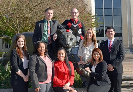 Hobby Fellows in front of E-Cullen cougar statue