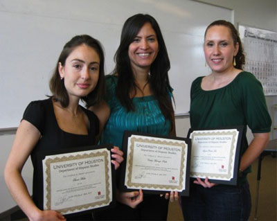 Three students during the awards ceremony