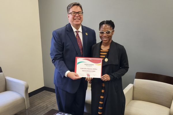 Gabrielle Malone-Miller (Right),  the Assistant Director of Sexual Misconduct Support Services (SMSS) at the Women & Gender Resource Center (WGRC), pictured with Interim Vice President, Dr. Daniel Maxwell.