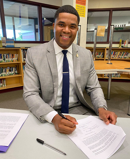 During Marlin ISD’s special board meeting, Henson signed the contract to become the district’s new superintendent.