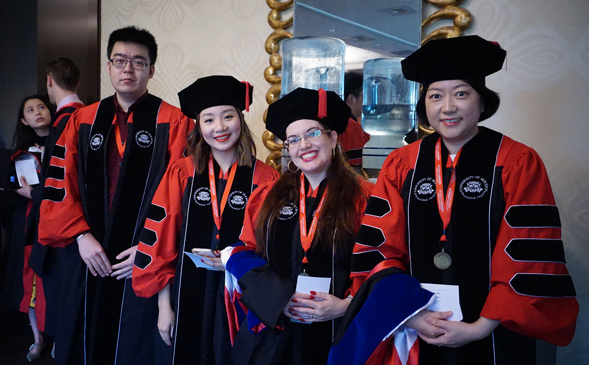 First Doctoral Cohort Crosses Commencement Stage - University of Houston