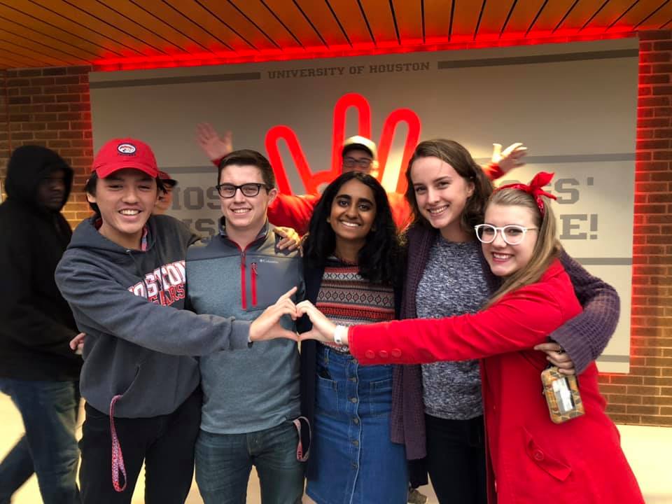 Students showing Bonner Love sign at Hoffheinz Pavilion