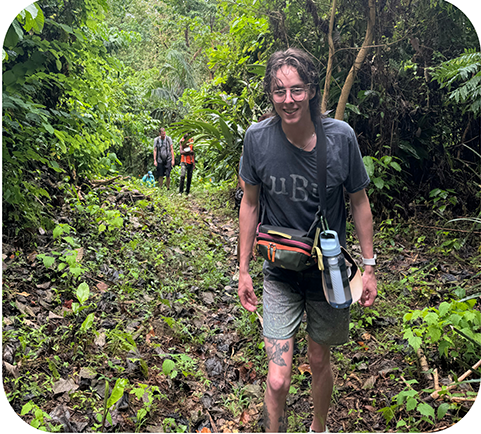 student in rainforest
