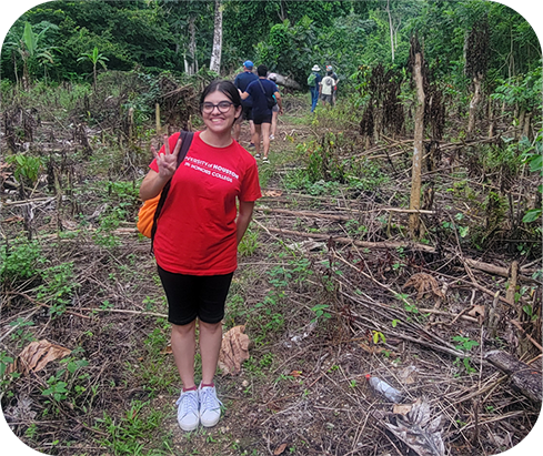 student in rainforest