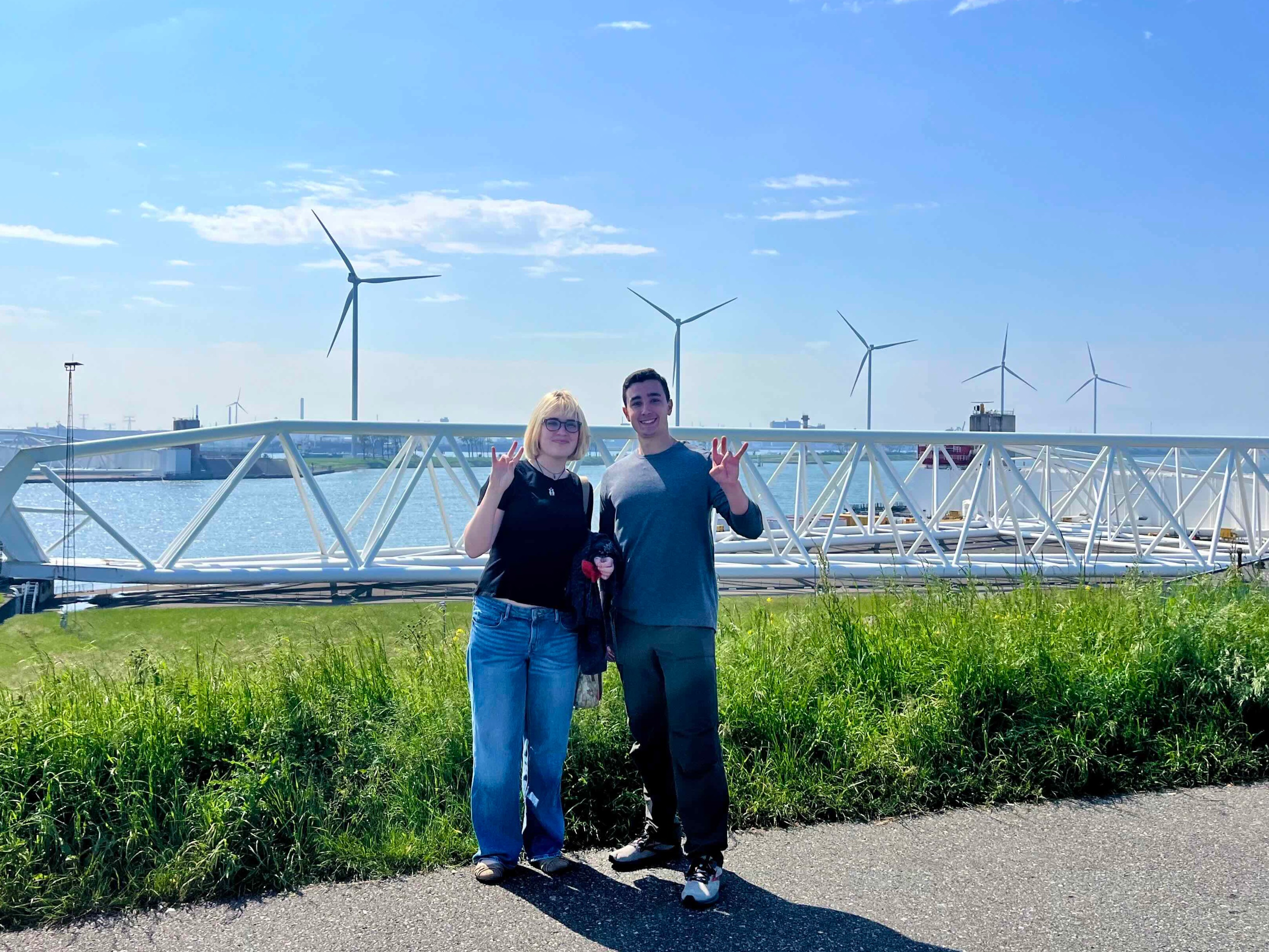 student near wind turbines