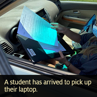 A student has arrived to pick up their laptop.