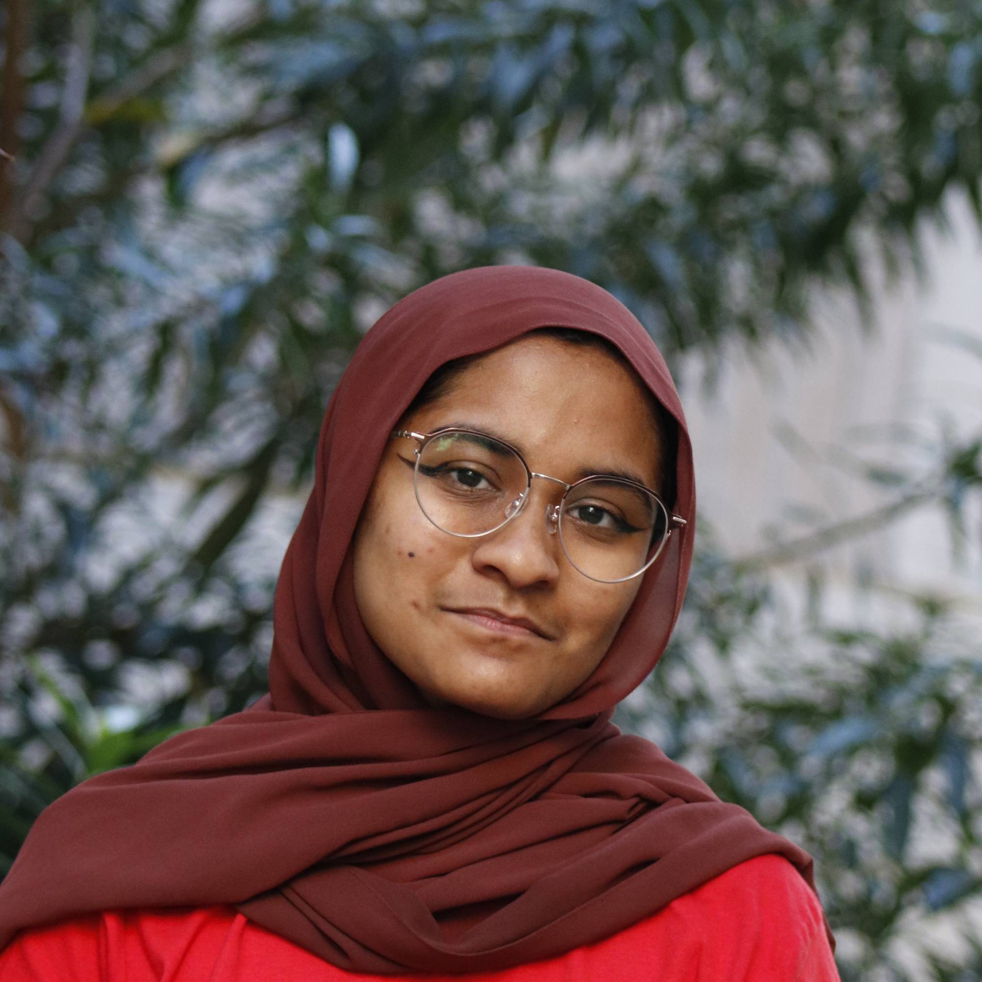 Aminah H. headshot