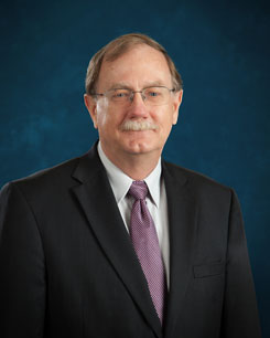 Dan E. Wells