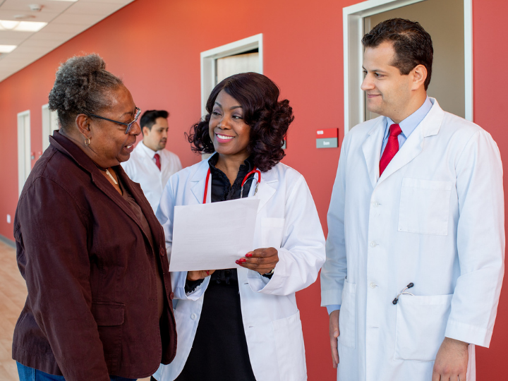 Doctors with patient