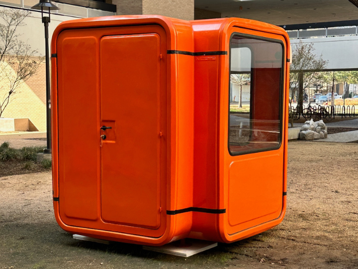 Red kiosk in the courtyard of the Fine Arts building