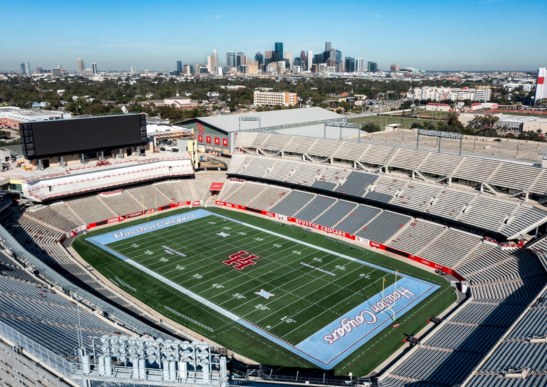 TDECU stadium with Houston Blue field and downtown Houston in the background
