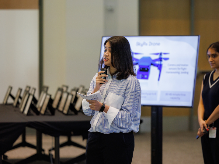 students presenting at a health care competition
