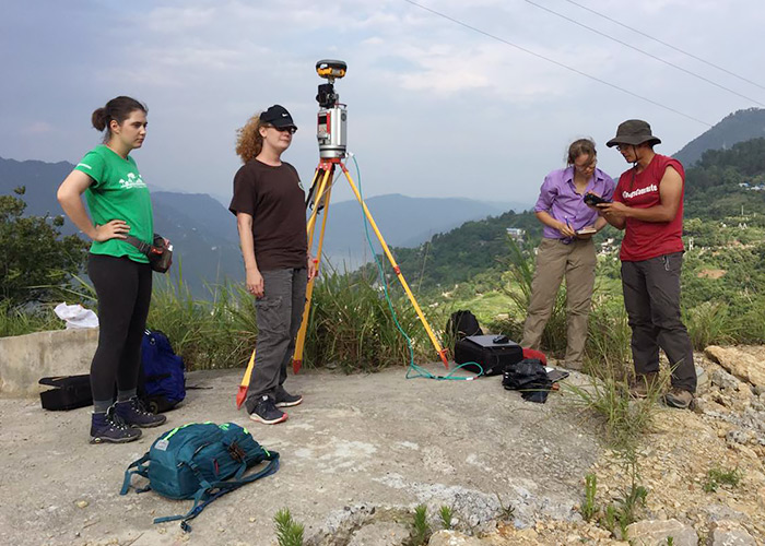 Students scanning the Huangtupo landslide using ground-based LiDAR.