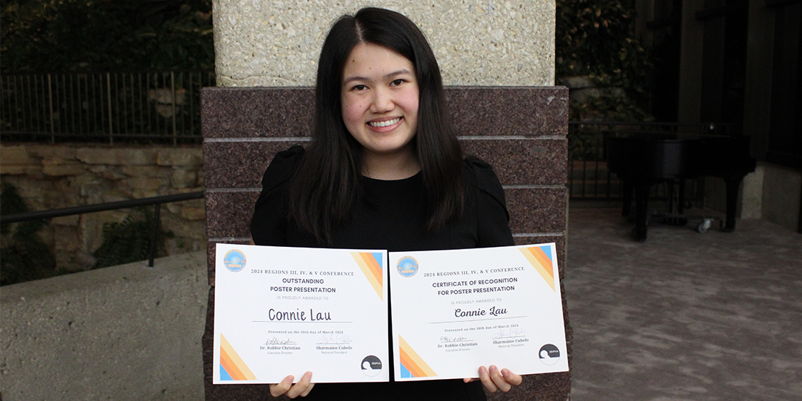 Connie Lau receives Outstanding Poster Award.
