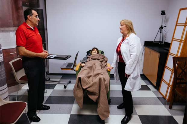 nurses at UH with palliative care mannequin