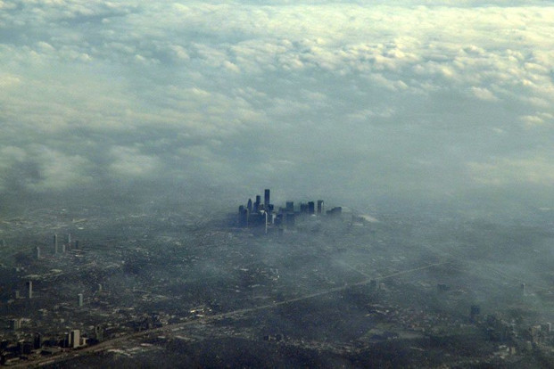 aerial shot of Houston from above the clouds