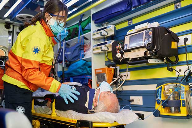 EMT reviving patient 