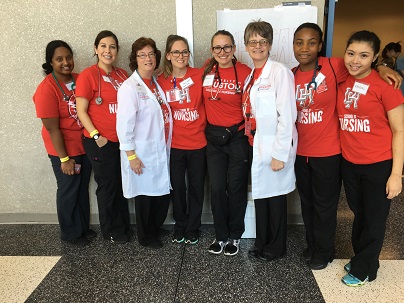 A group of nursing students and faculty standing together
