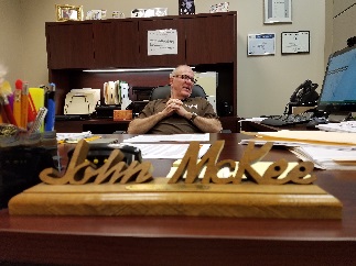 A man sitting at desk