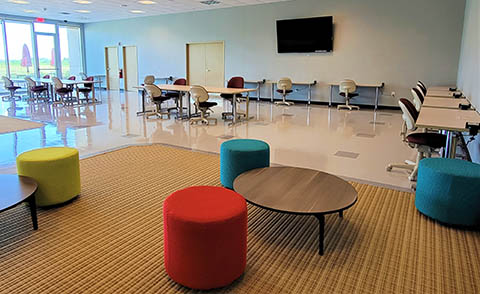 A large open space with study tables and seating.