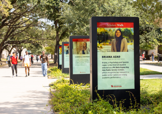 Scholars Walk digital installation highlighting several UH students and their accomplishments