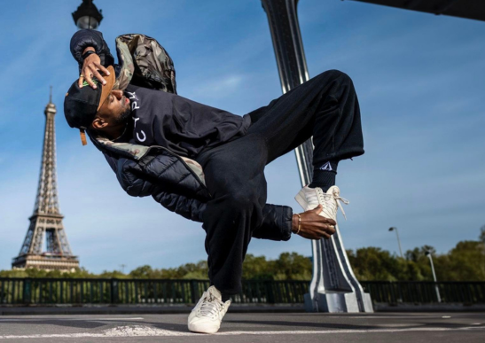 Image of Jeffrey Louis breakdancing in Paris. Photo Courtesy of Little Shao