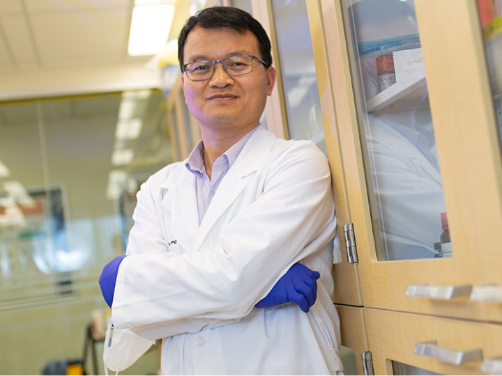 Picture of Mingfu Wu, associate professor of pharmacology, posing for a photo