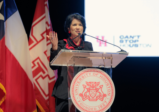 Image of President Renu Khator speaking at the podium.