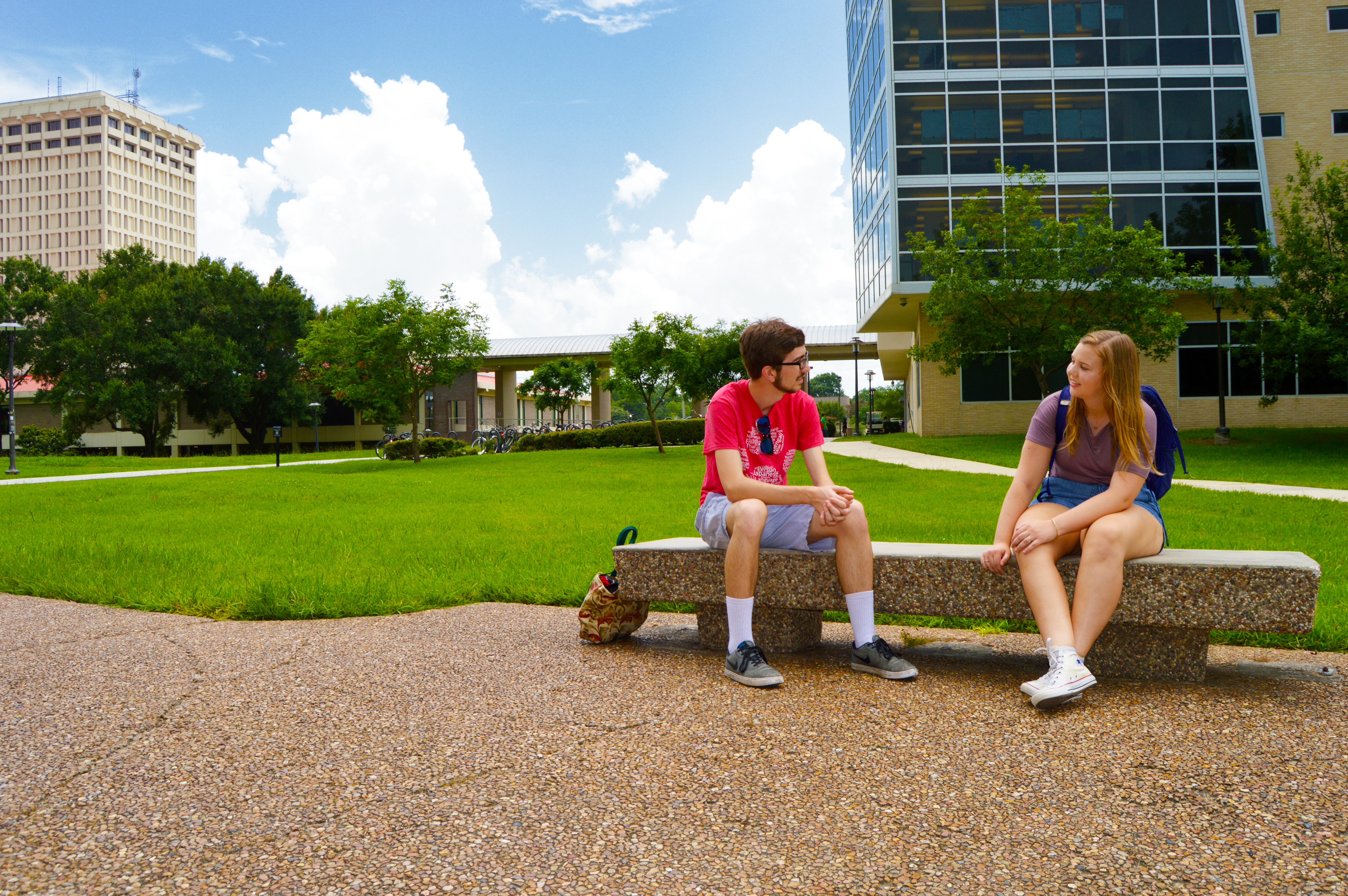 Two students chatting on campus.