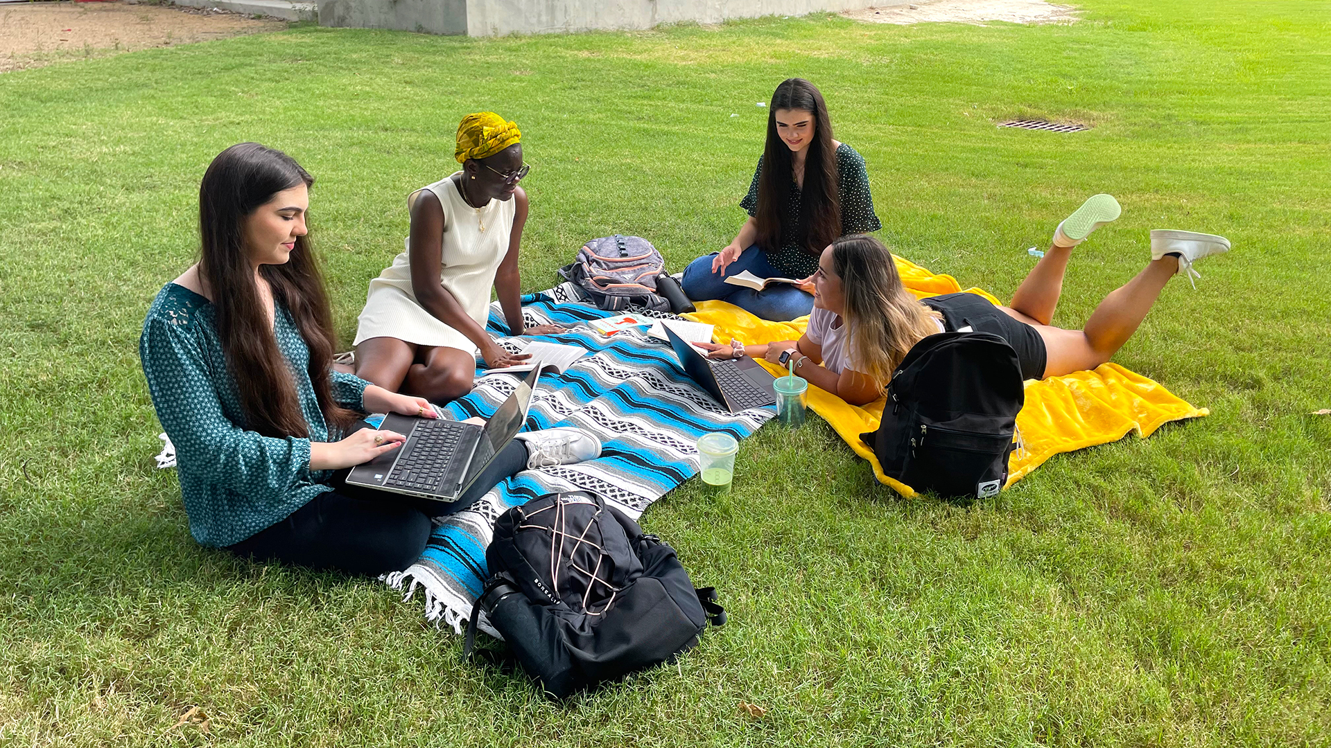 Students studying at Lynn Eusan Park on campus.